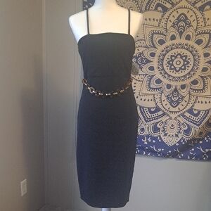 Elegant Black Dress with Chain Detail